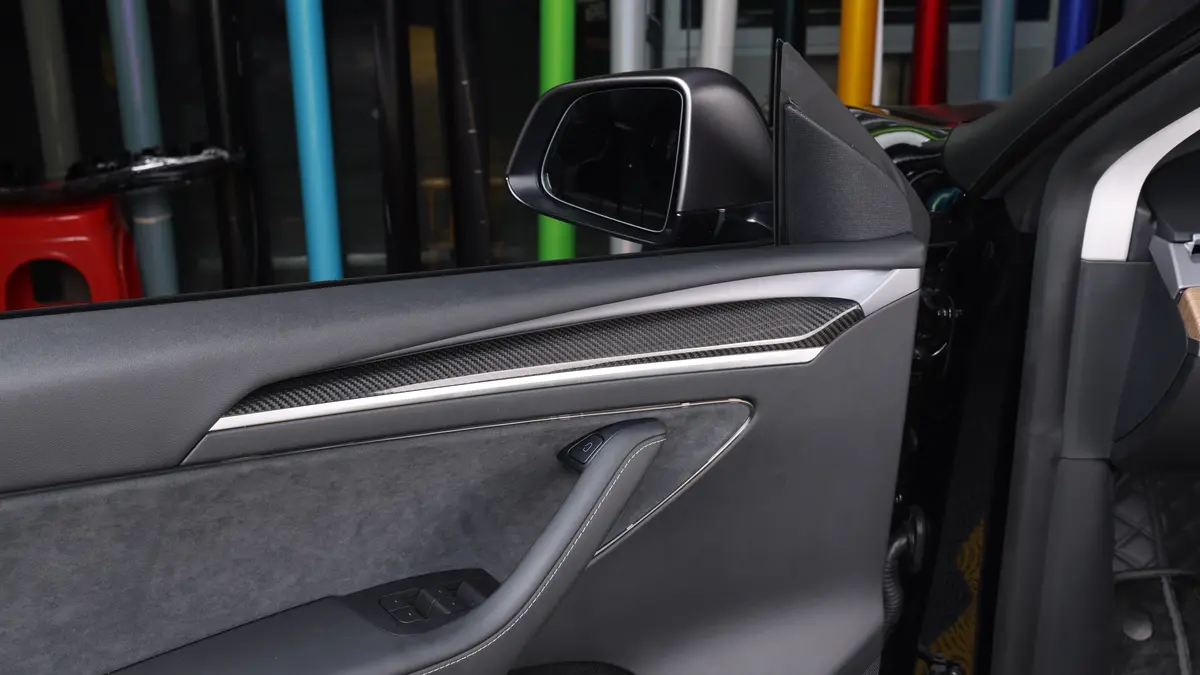 Dynacarbon™ Carbon Fiber Door Panel Trim For Tesla Model 3 2021-2023 1
