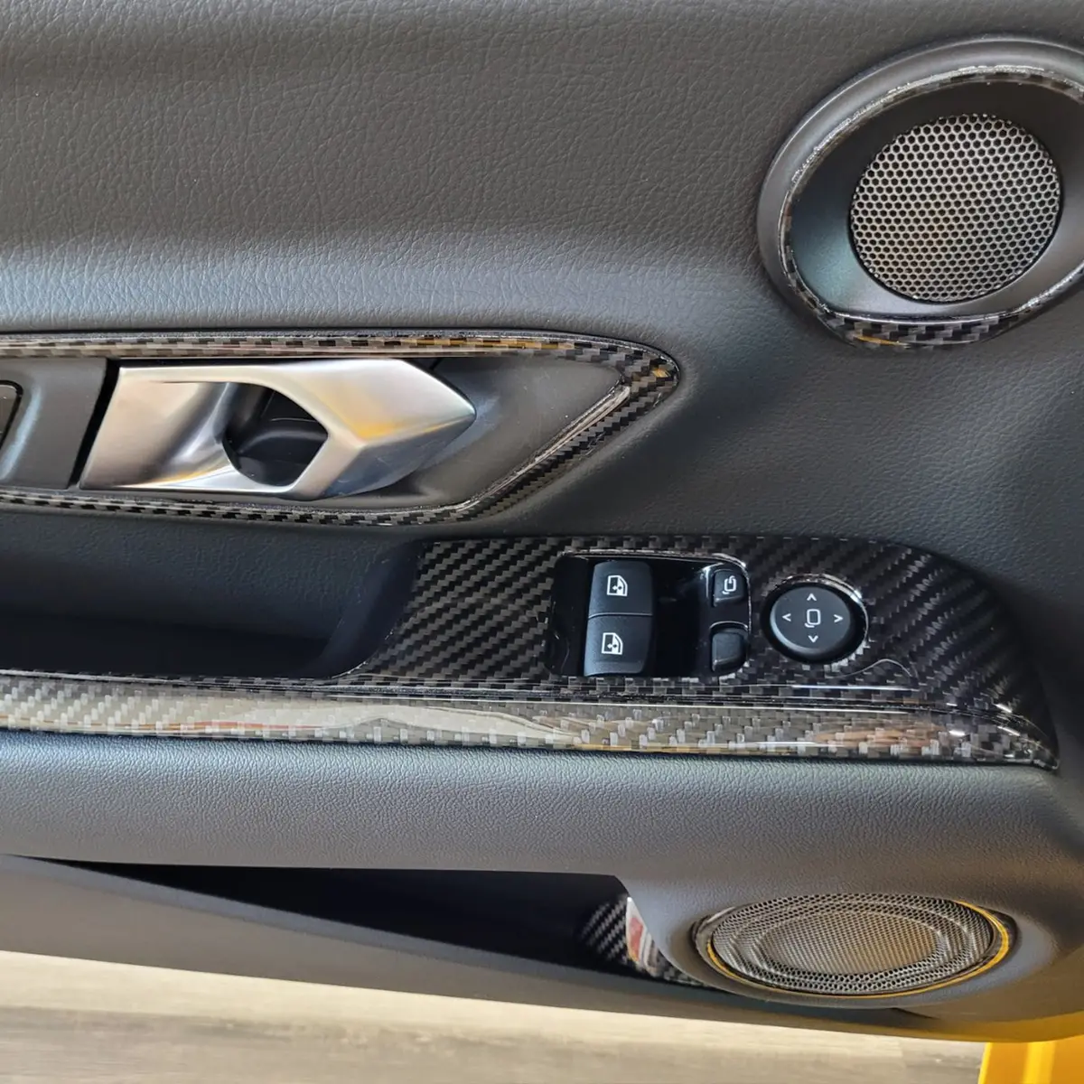 Dynacarbon™️ Carbon Fiber Window Control Trim For Toyota Supra 2019-2023 1
