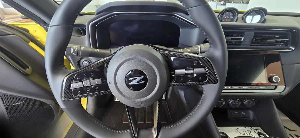 Dynacarbon™️ Carbon Fiber Steering Trim Nissan Z 2023-2026 2
